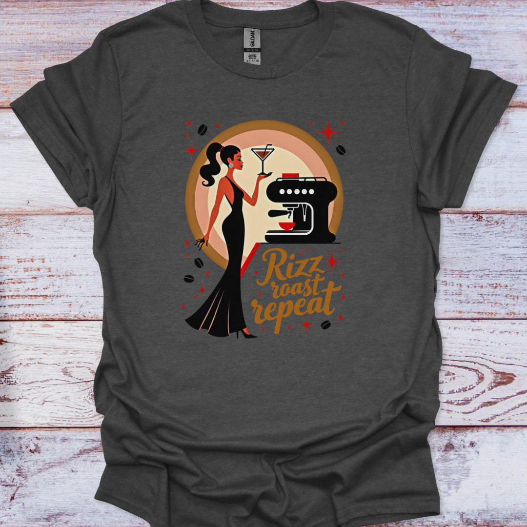 Dark gray t-shirt with a graphic design of a woman, coffee machine, and text on a wooden surface.