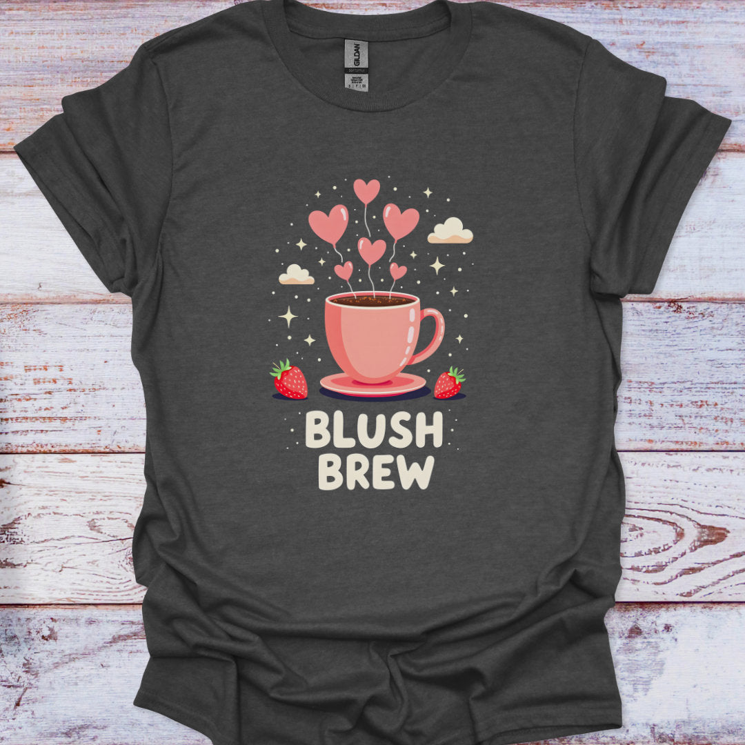 Dark gray t-shirt with a pink coffee cup graphic and 'Blush Brew' text on a wooden surface