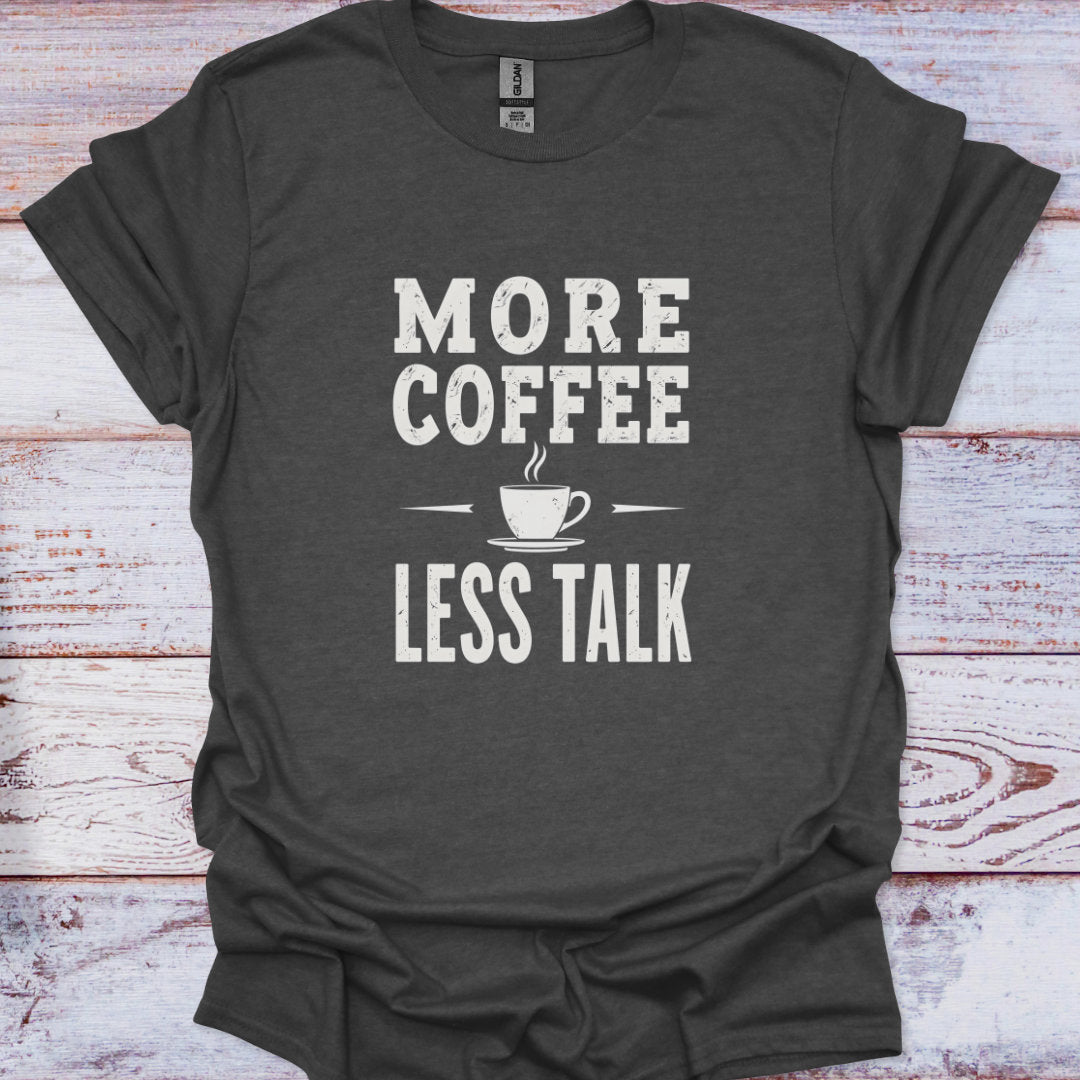 Dark gray t-shirt with 'More Coffee Less Talk' text on a wooden surface