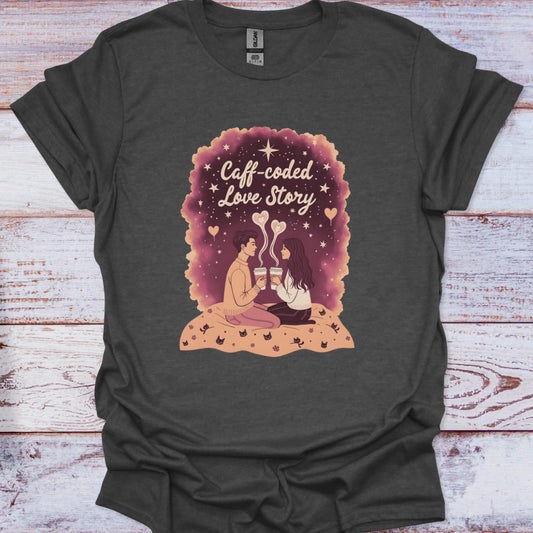 Dark gray t-shirt with 'Caff-coded Love Story' graphic on a wooden surface
