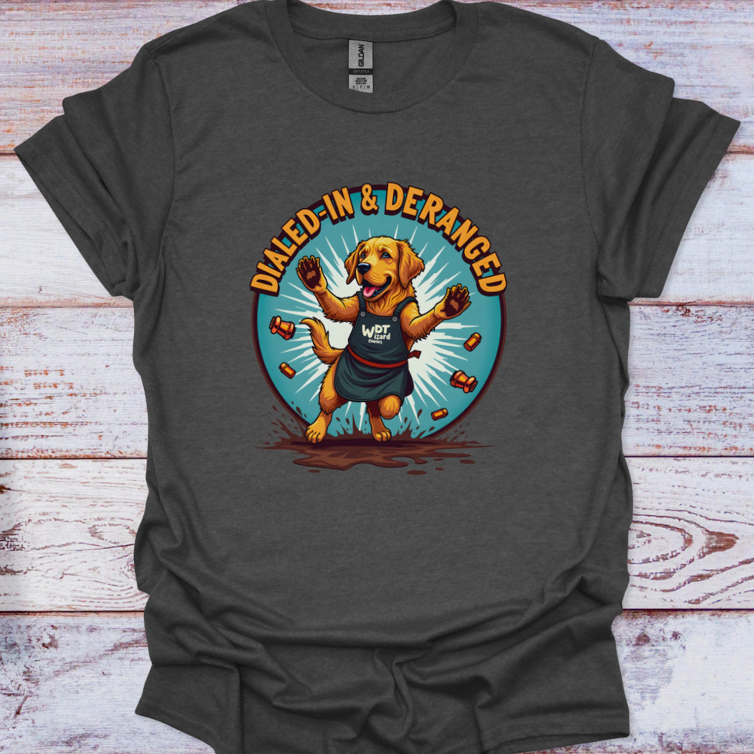 Gray t-shirt with a dog graphic and 'Dialed-In & Deranged' text on a wooden surface
