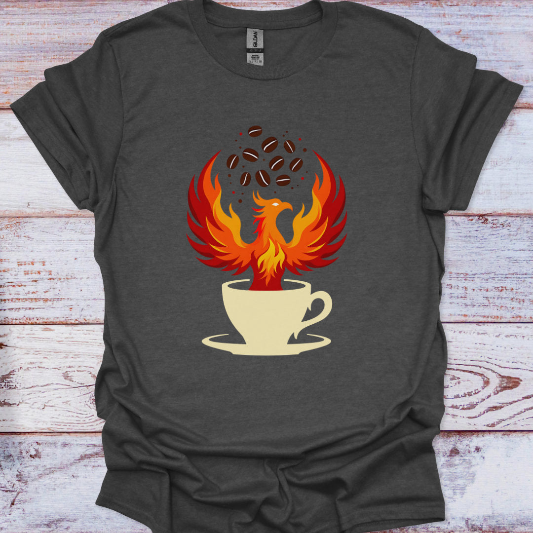 Dark gray t-shirt with a phoenix rising from a coffee cup design on a wooden surface