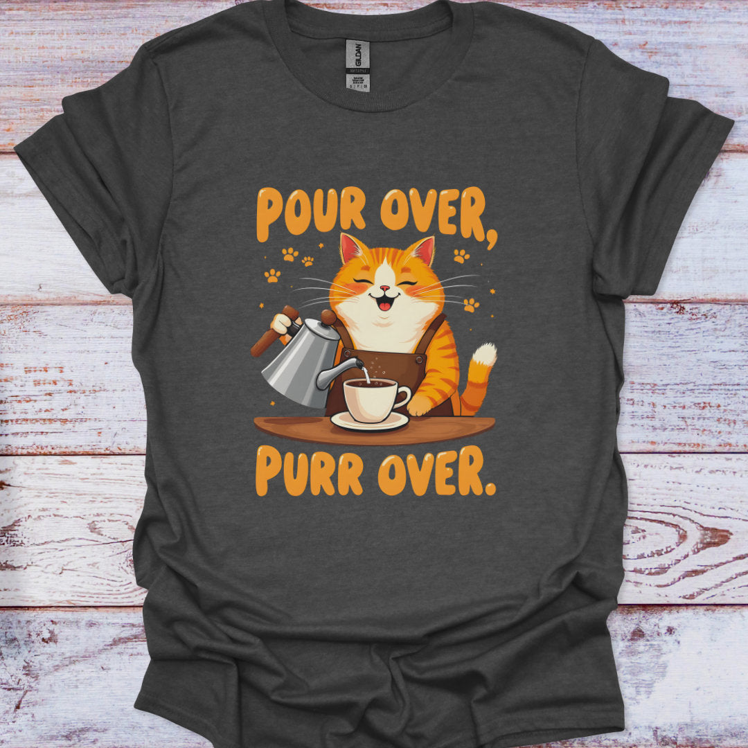 Gray t-shirt with a cat pouring coffee design and text 'Pour Over, Purr Over' on a wooden surface.
