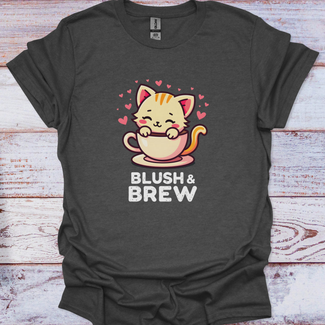 Dark gray t-shirt with a cat-themed graphic and text 'Blush & Brew' on a wooden surface.