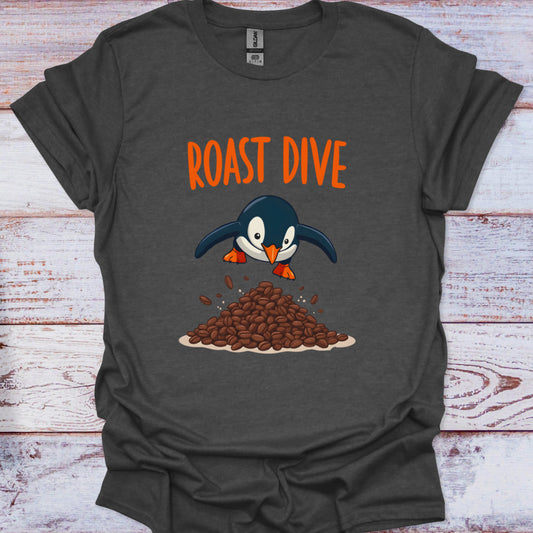 Dark gray t-shirt with a penguin graphic and 'Roast Dive' text on a wooden surface