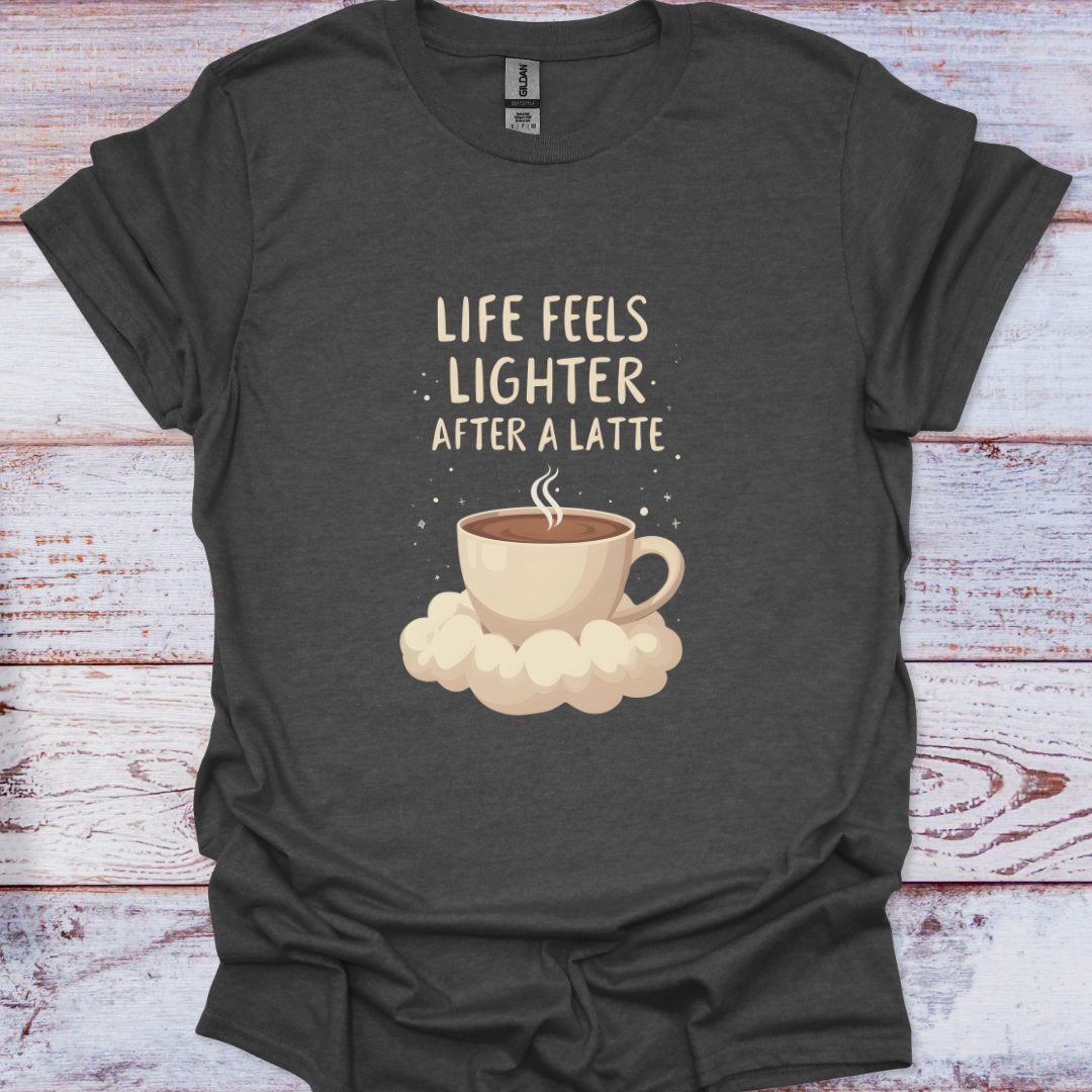 Dark gray t-shirt with a coffee cup graphic and text on a wooden surface