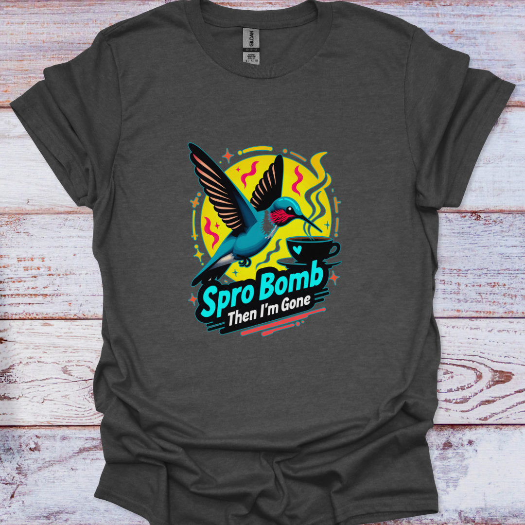 Dark gray t-shirt with a colorful graphic of a hummingbird and text on a wooden surface