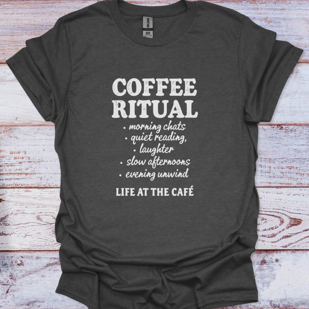 Dark gray t-shirt with white text 'Coffee Ritual' on a wooden surface