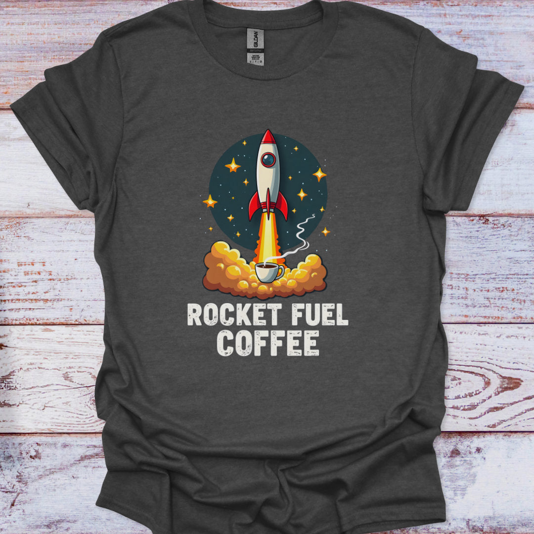 Dark gray t-shirt with a graphic of a rocket and 'Rocket Fuel Coffee' text on a wooden surface
