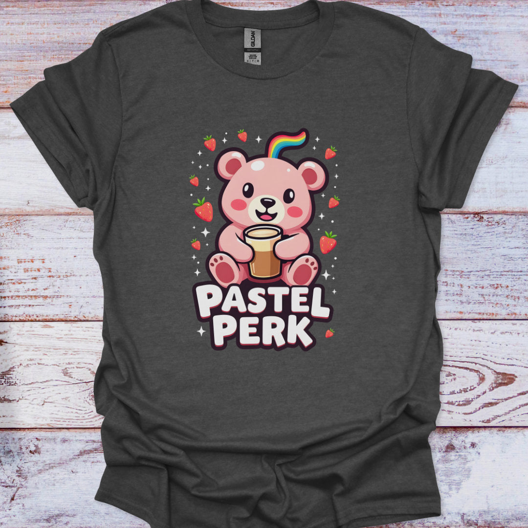 Dark gray t-shirt with a cartoon bear and 'Pastel Perk' text on a wooden surface