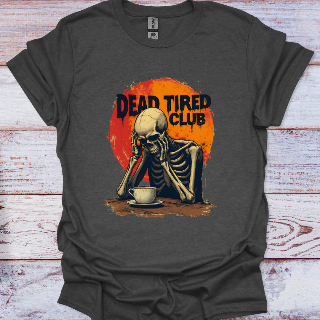 Dark gray t-shirt with a skeleton holding a coffee cup and 'Dead Tired Club' text on an orange background.