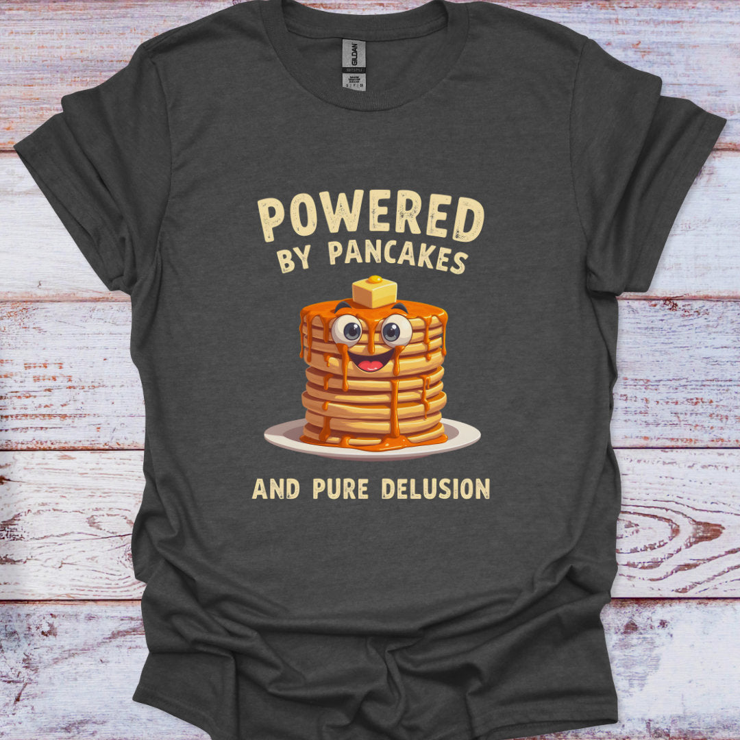 Dark gray t-shirt with a cartoon stack of pancakes and text on a wooden surface