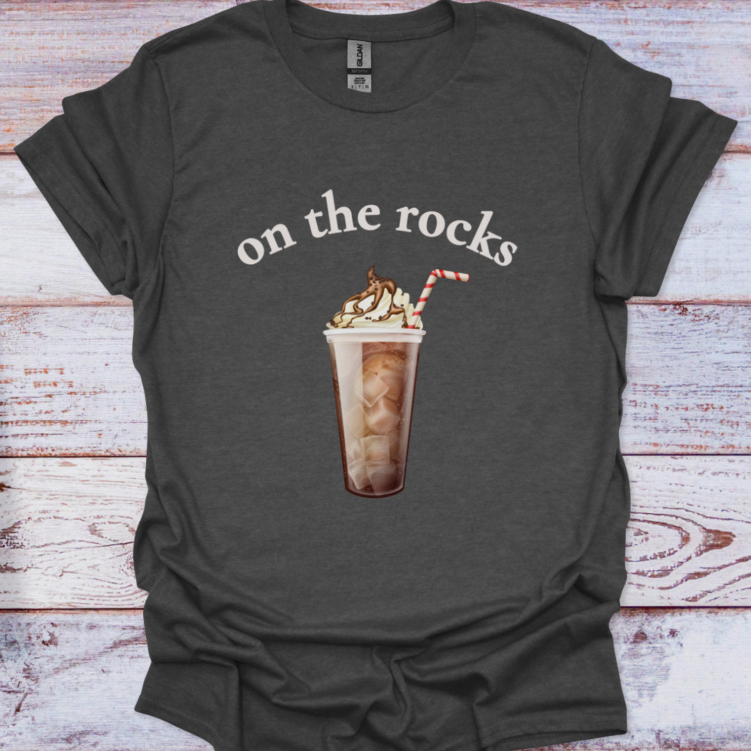 Dark gray t-shirt with a graphic of an iced coffee and text 'on the rocks' on a wooden surface.