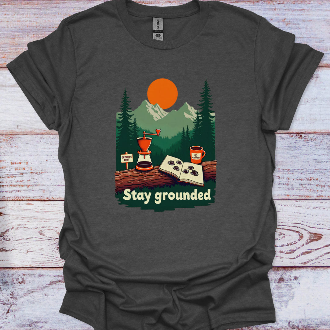 Dark gray t-shirt with a graphic of a coffee grinder, cup, and nature scene on a wooden surface.