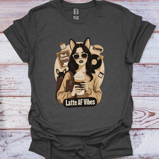 Dark gray t-shirt with a graphic of a person holding a coffee cup and text 'Latte AF Vibes' on a wooden surface.