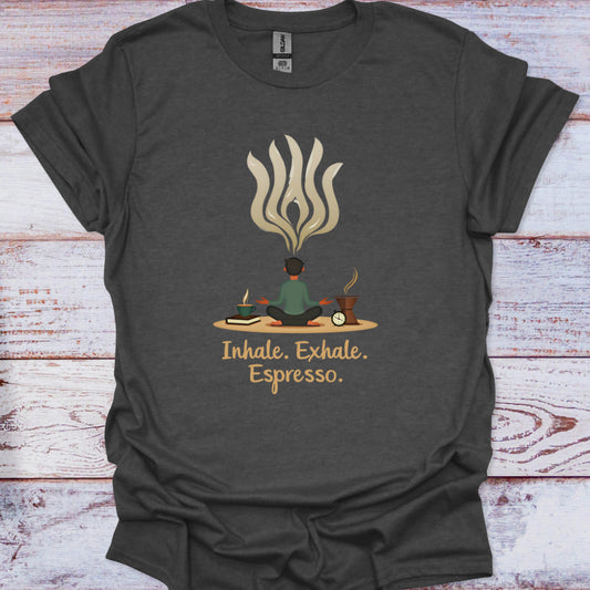 Dark gray t-shirt with a graphic design of a person meditating with coffee cups and the text 'Inhale. Exhale.
