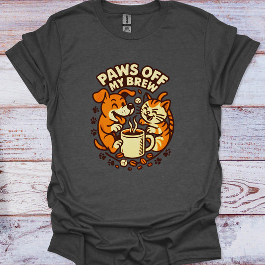 Dark gray t-shirt with a graphic of a dog and cat drinking coffee and 'Paws Off My Brew' text on a wooden surface.