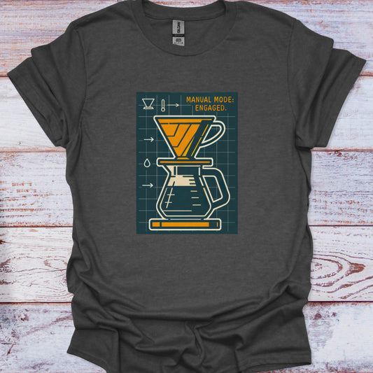 Dark gray t-shirt with a coffee brewing graphic on a wooden surface