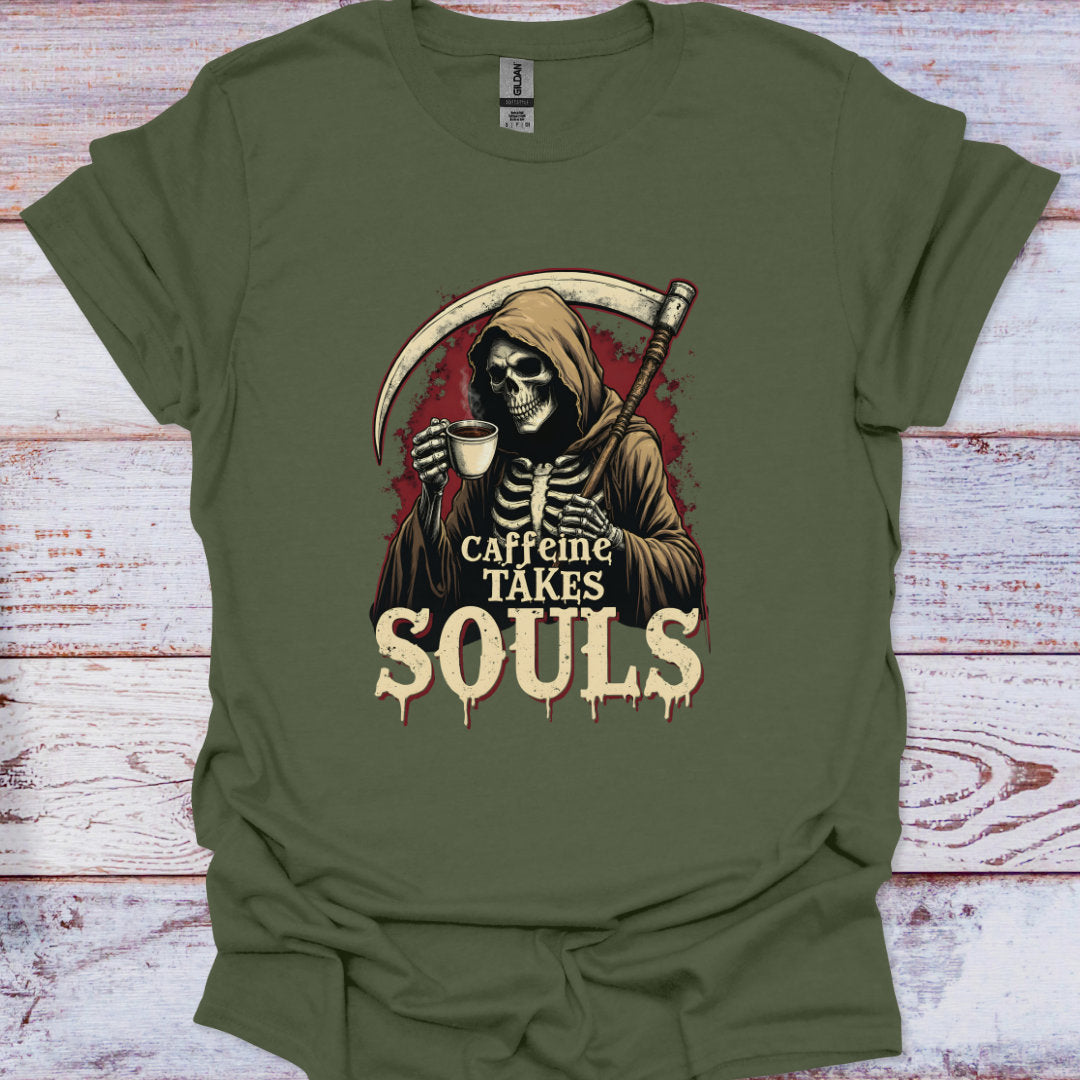 Green t-shirt with a skeleton holding a coffee cup and text 'Caffeine Takes Souls' on a wooden surface.