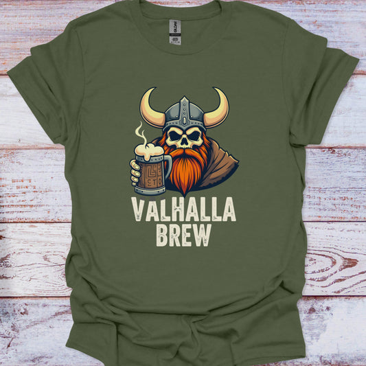Green t-shirt with a Viking design holding a mug of beer and 'Valhalla Brew' text on a wooden surface.
