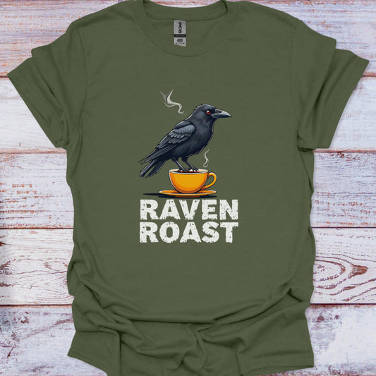 Green t-shirt with a crow and coffee cup design on a wooden surface