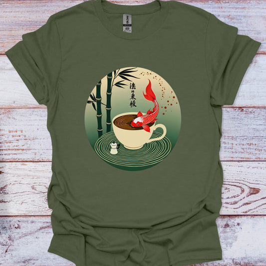 Green t-shirt with a cup and koi fish design on a wooden surface