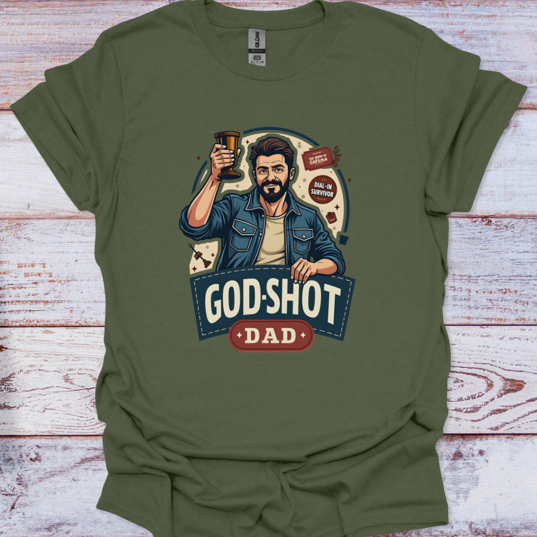 Green t-shirt with a graphic of a man holding a beer mug and text 'God-shot Dad' on a wooden surface.