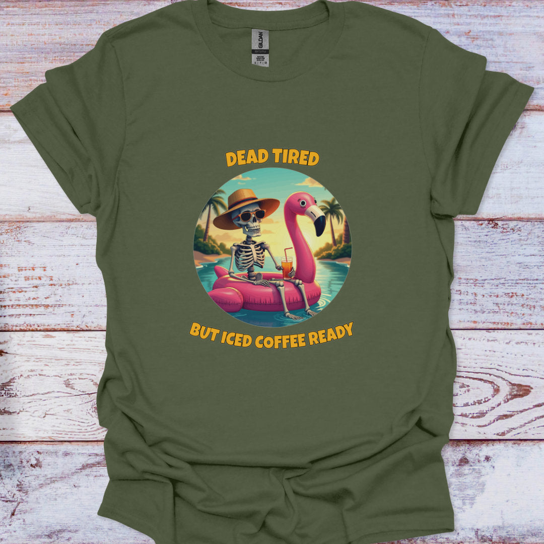 Green t-shirt with a flamingo and skeleton design on a wooden surface
