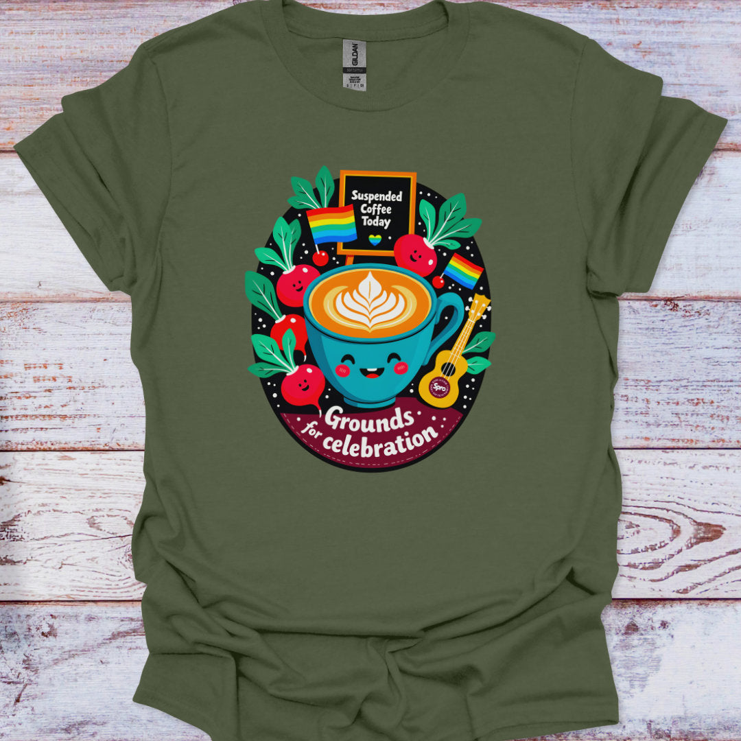 Green t-shirt with a colorful coffee-themed graphic on a wooden surface
