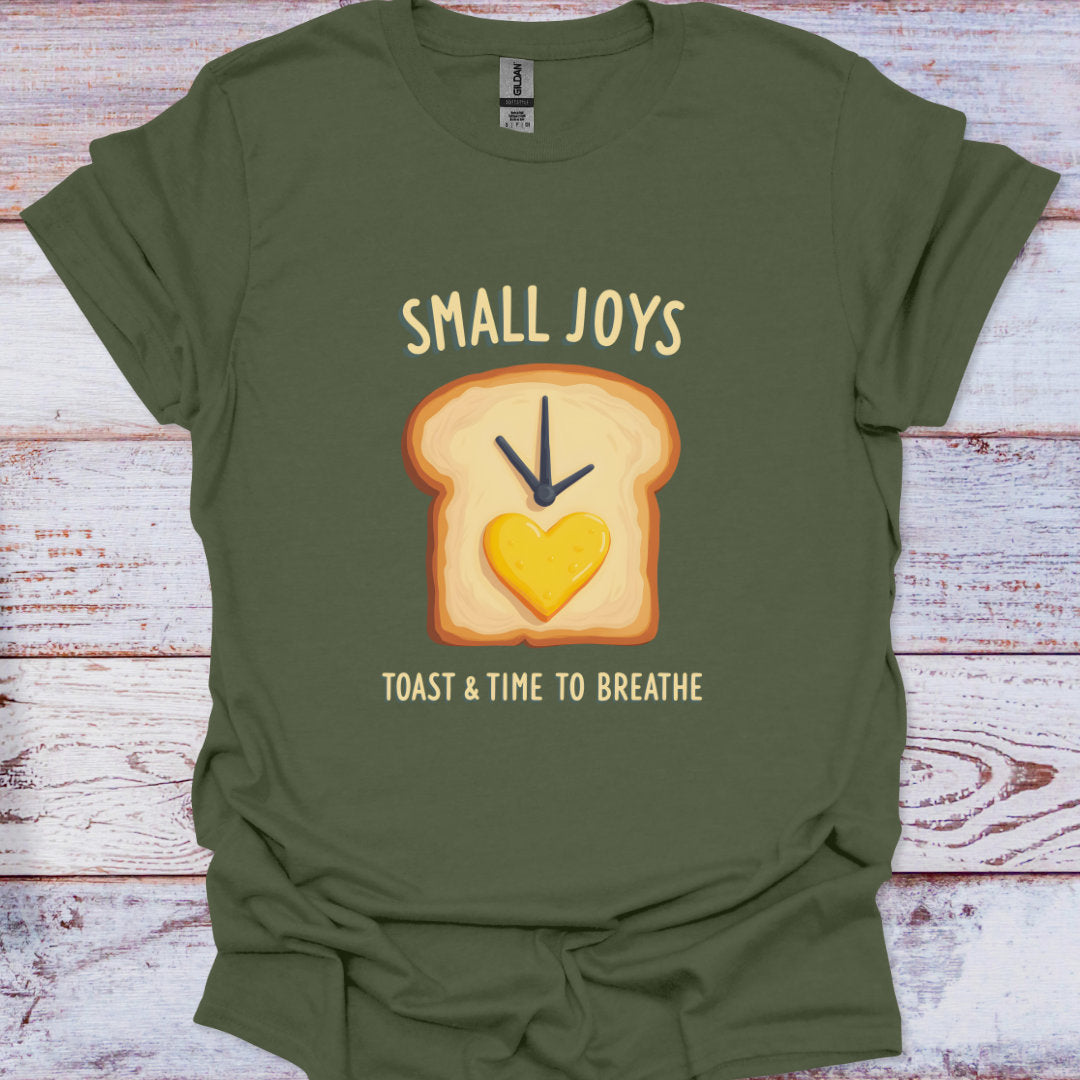 Green t-shirt with a graphic of toast and text on a wooden surface