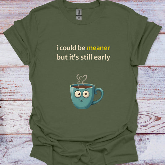 Green t-shirt with a cartoon coffee cup and text on a wooden surface