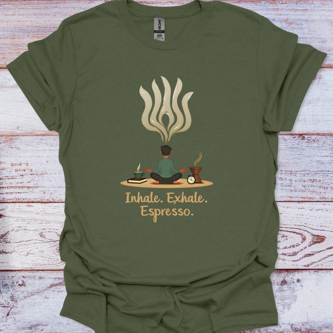 Green t-shirt with a graphic design of a person meditating with flames and text 'Inhale. Exhale.