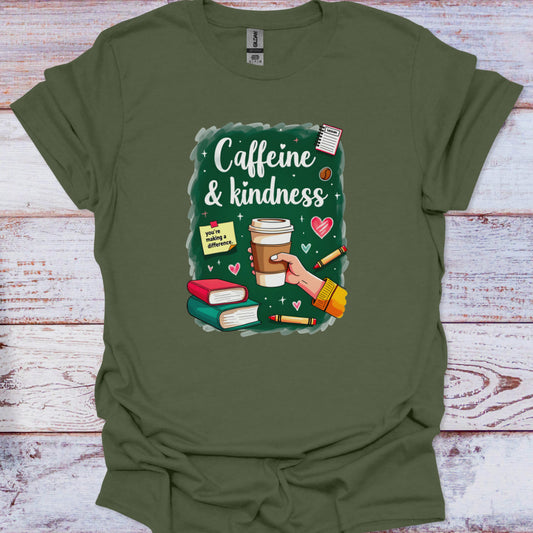 Green t-shirt with 'Caffeine & Kindness' graphic design on a wooden surface