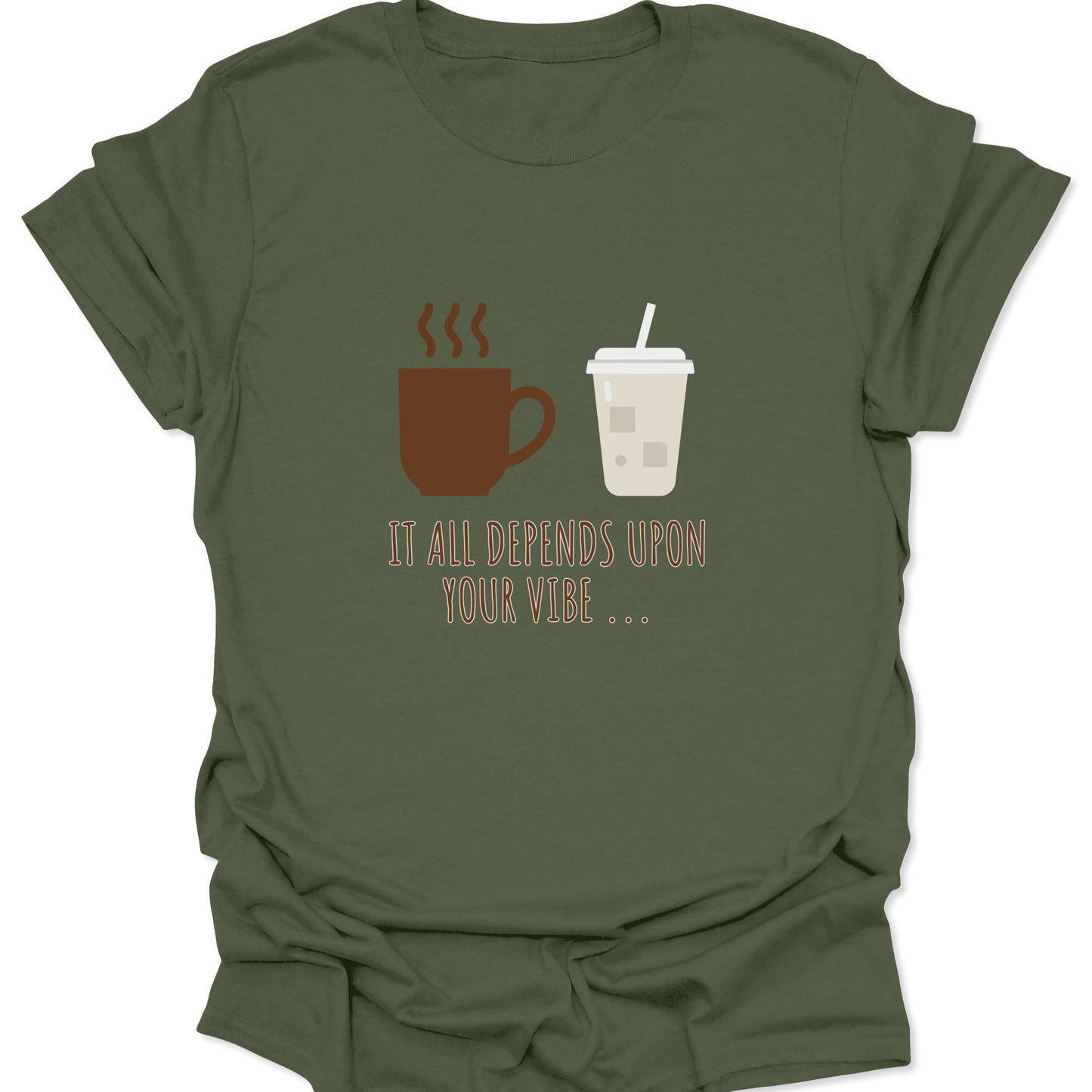 Graphic tee on military green fabric featuring a brown steaming coffee mug and a light beige iced coffee cup with the text "IT ALL DEPENDS UPON YOUR VIBE..." in thin brown lettering.