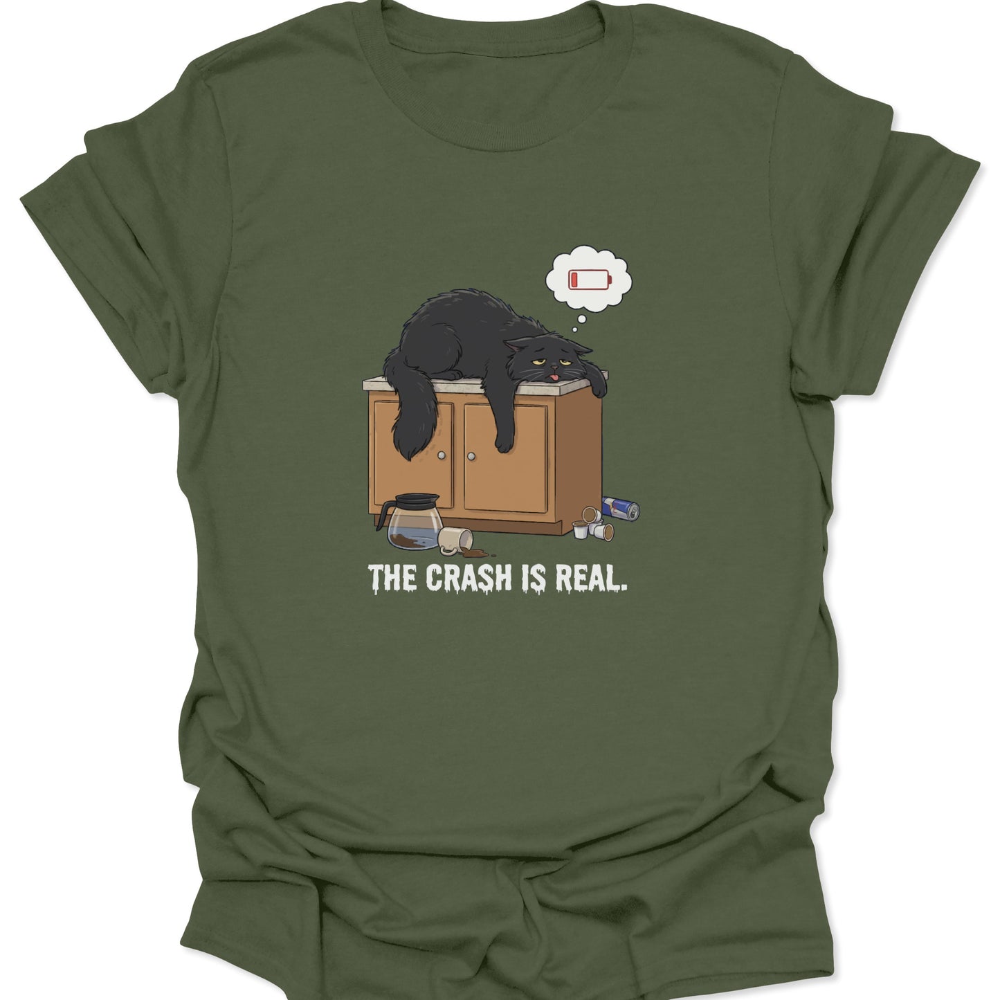 Graphic tee on military green fabric showing a tired black cat slumped over a counter with a low battery thought bubble.