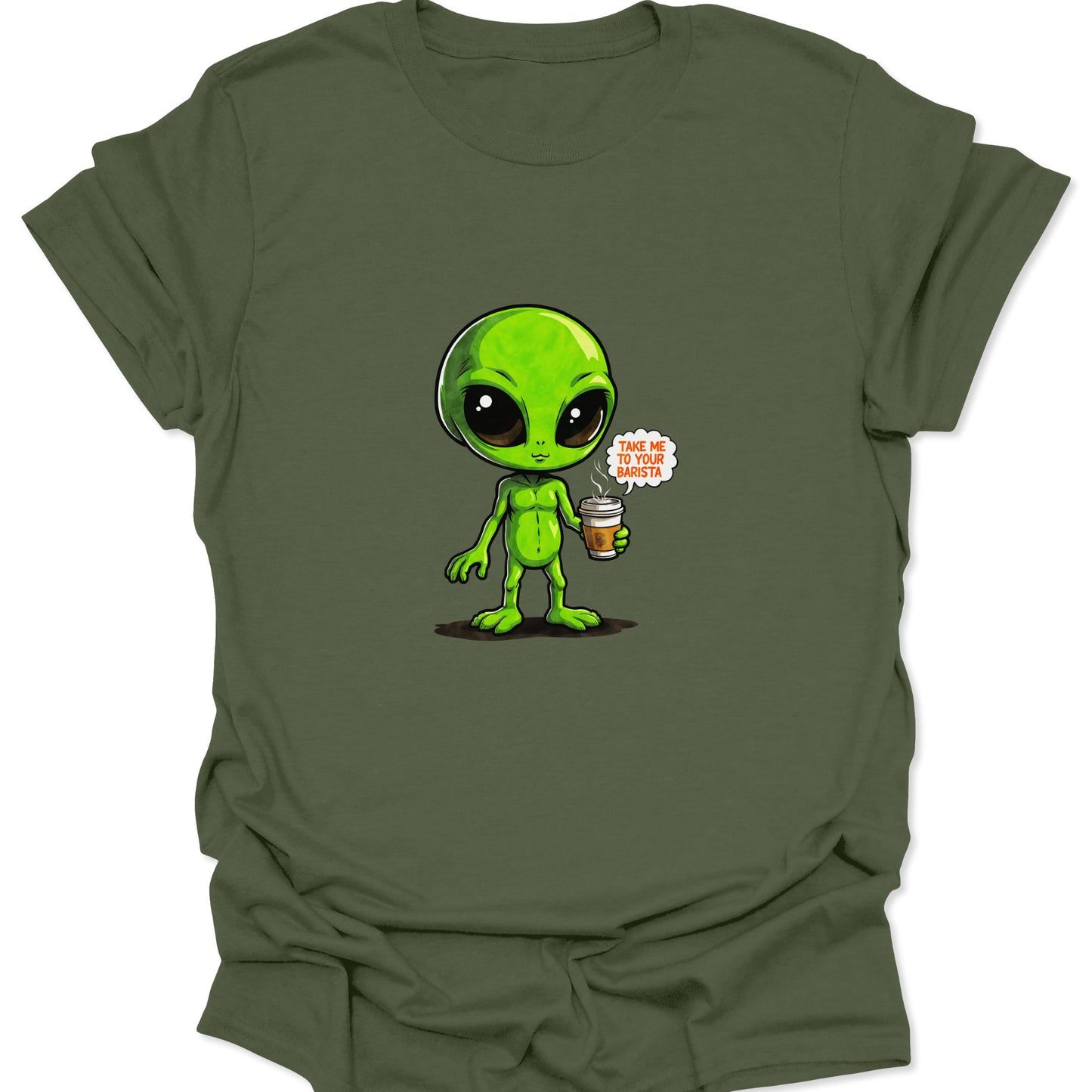 Extraterrestrial graphic holding a cup of coffee on a military green t-shirt. The alien is bright green with large black eyes, a perfect blend of space and earth tones.