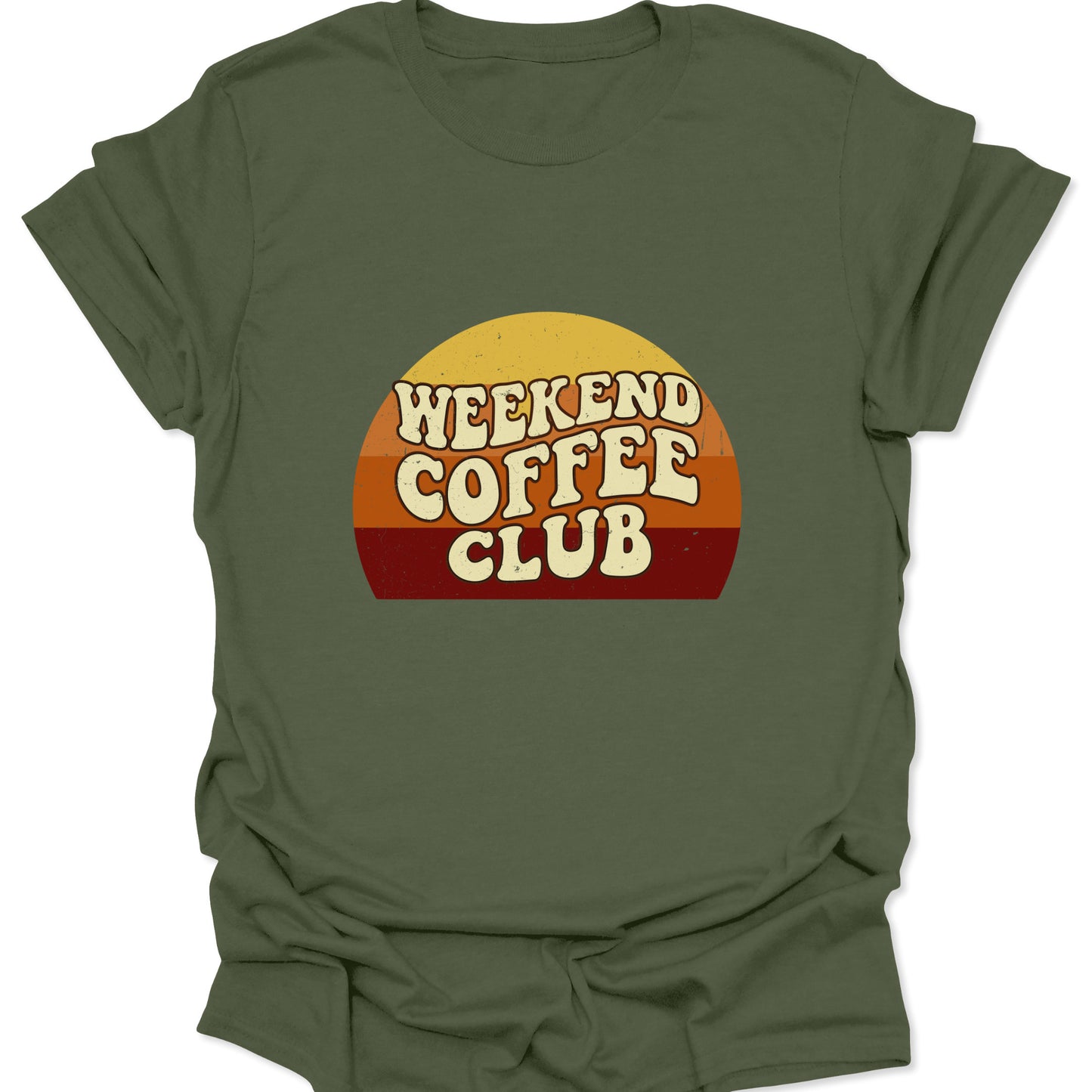 Graphic tee on a military green fabric background featuring a retro sunset semi-circle with "Weekend Coffee Club" text in a cream-colored, bubbly 70s font.