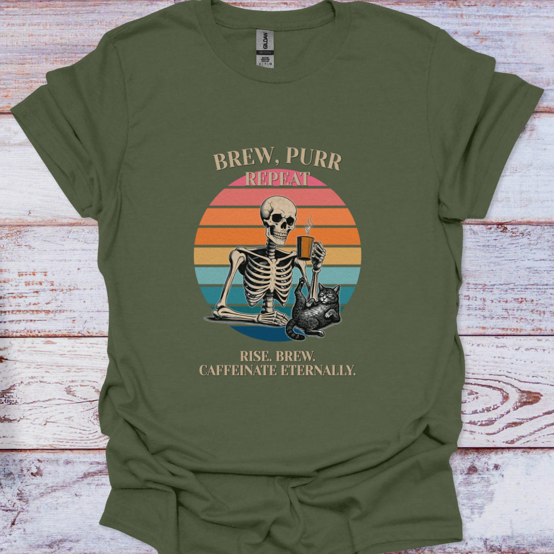 Green t-shirt with a skeleton and cat graphic and text on a wooden surface
