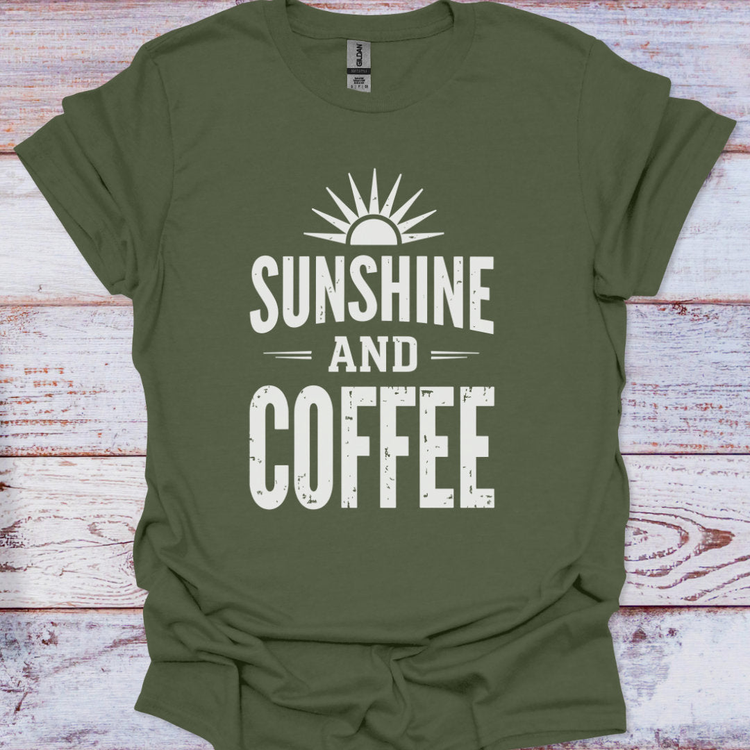 Green t-shirt with 'Sunshine and Coffee' text on a wooden surface