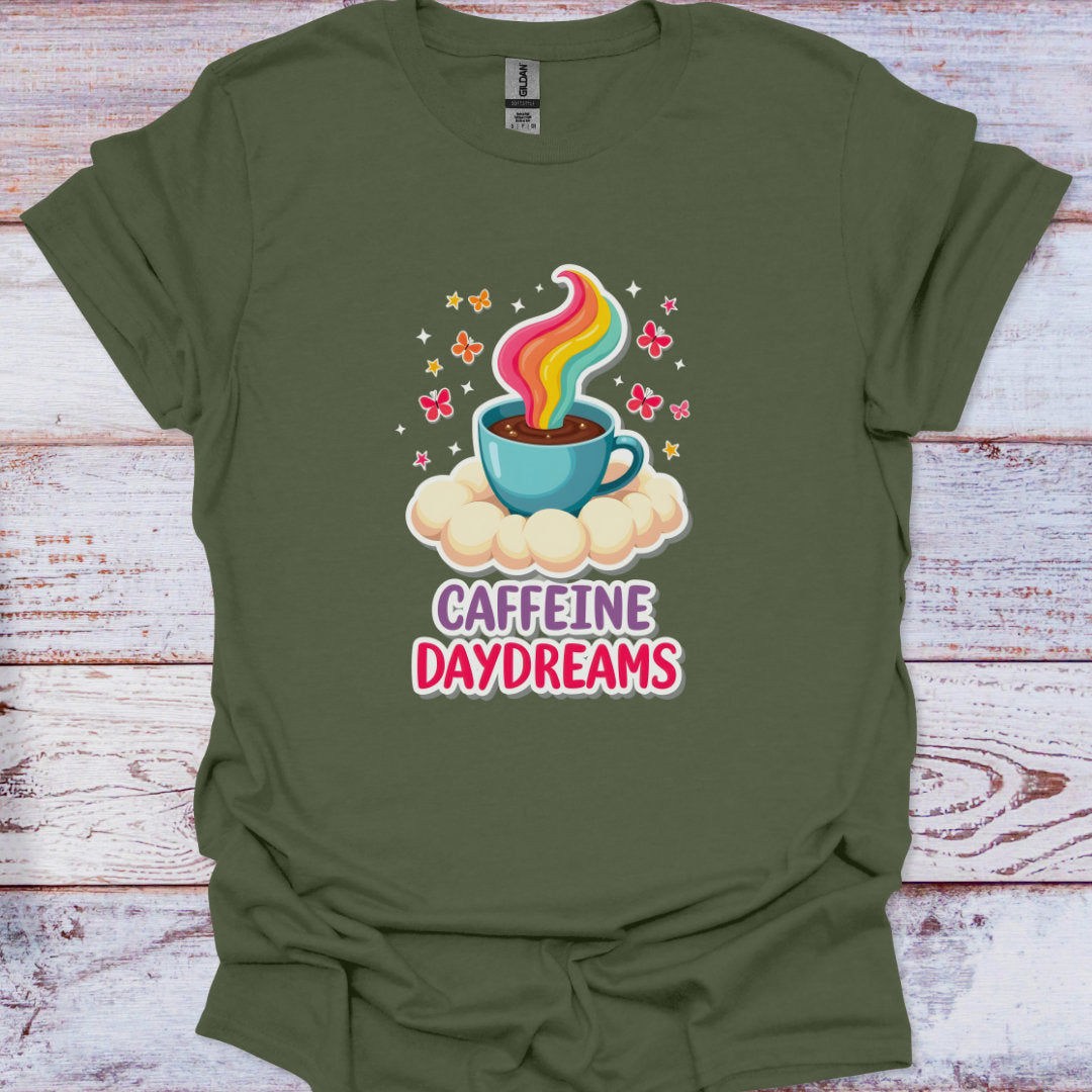 Green t-shirt with a colorful coffee cup graphic and 'Caffeine Daydreams' text on a wooden surface.