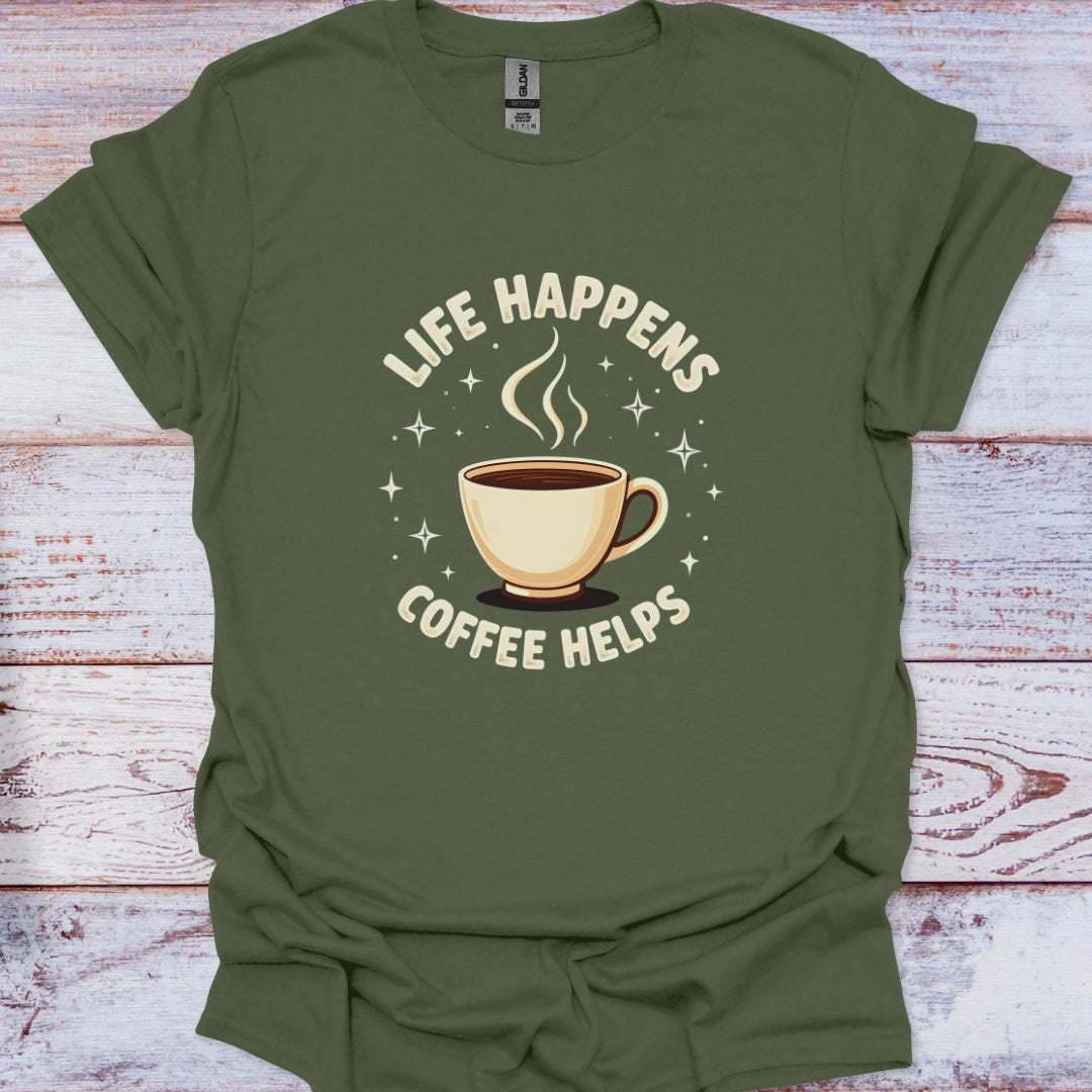 Green t-shirt with 'Life Happens Coffee Helps' graphic on a wooden surface