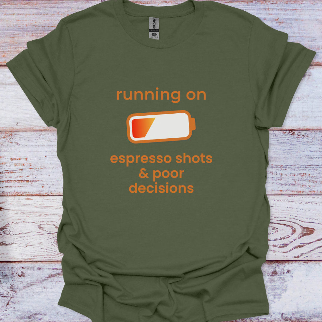 Green t-shirt with orange text and battery graphic on a wooden surface