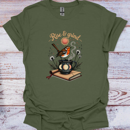 Green t-shirt with a graphic of a bird, cup, and book on a wooden surface