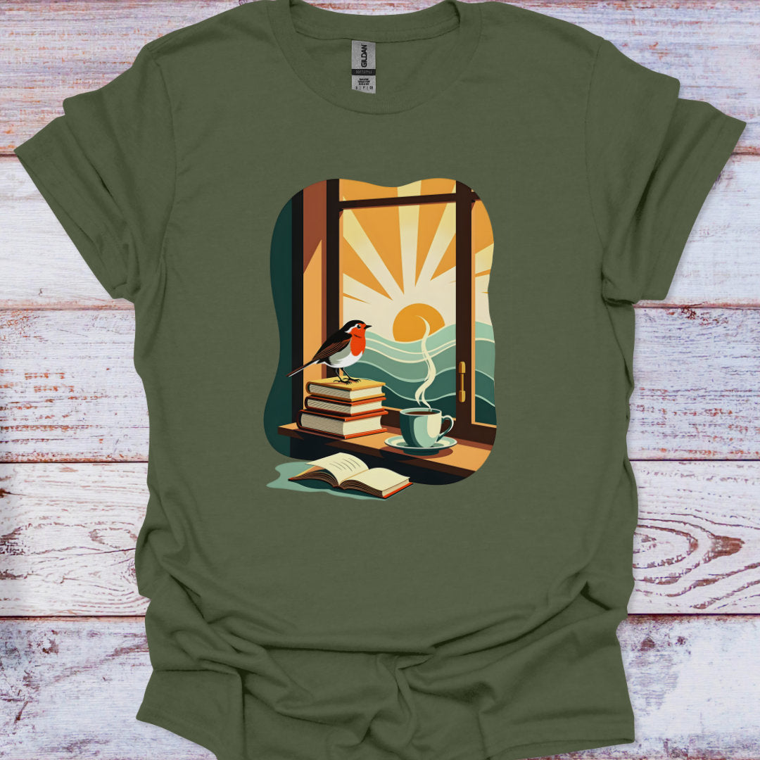 Green t-shirt with a graphic of a window, books, a cup, and a bird on a wooden surface.
