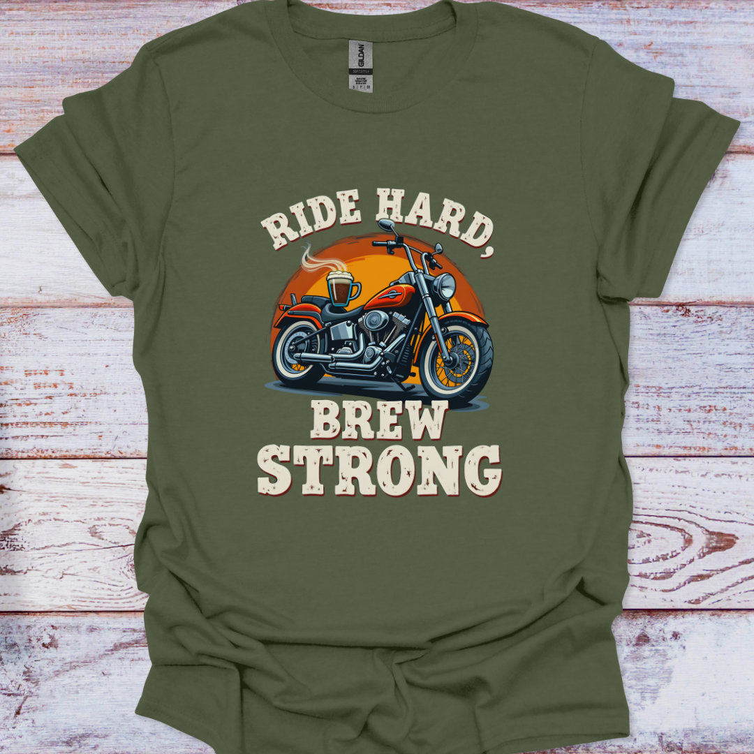 Green t-shirt with a motorcycle graphic and text 'Ride Hard, Brew Strong' on a wooden surface.