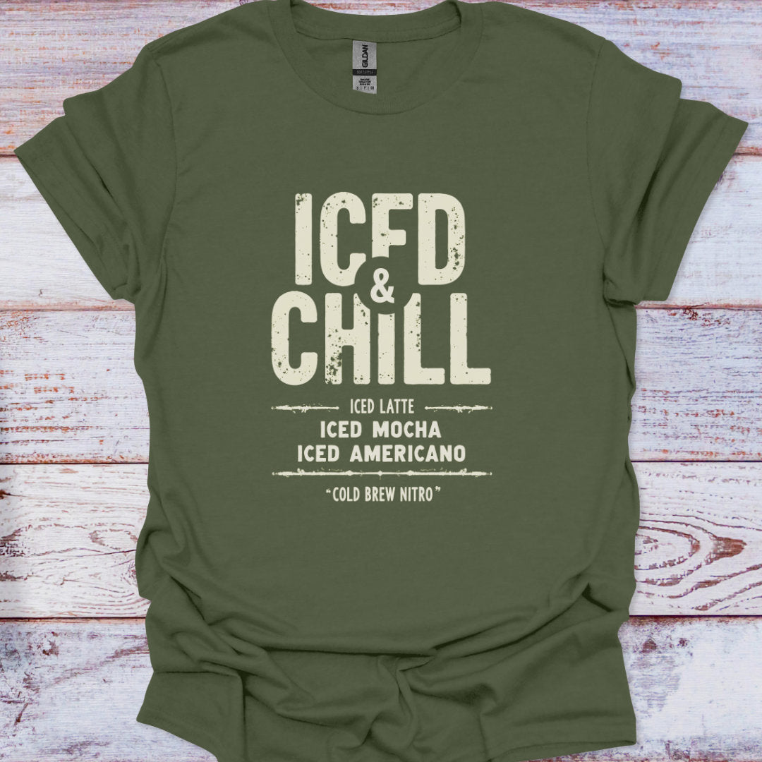 Green t-shirt with 'ICED & CHILL' text on a wooden surface