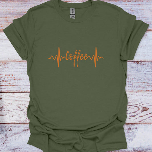 Green t-shirt with 'coffee' design on a wooden surface
