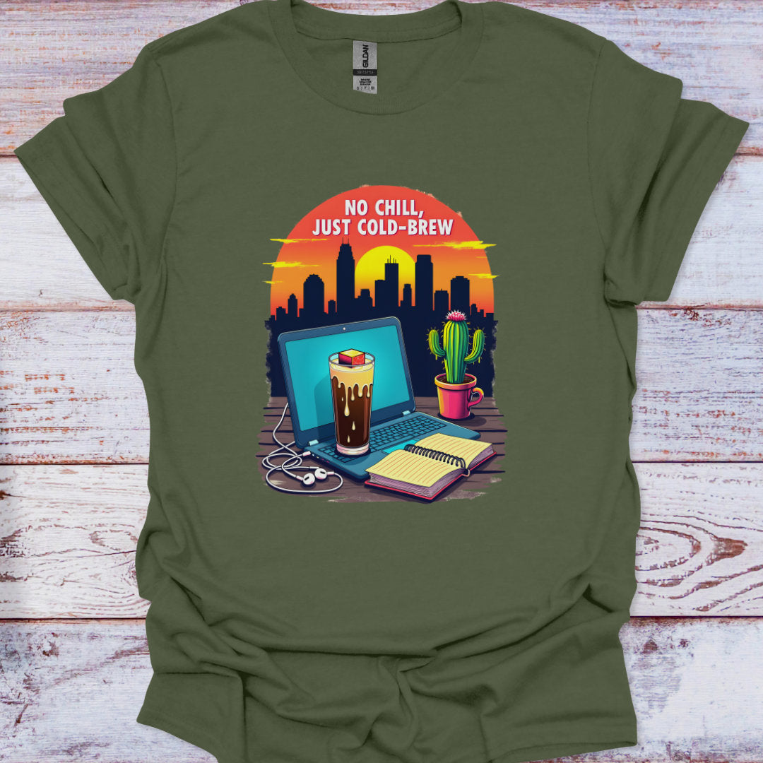Green t-shirt with a graphic of a laptop, coffee, and cactus on a wooden surface