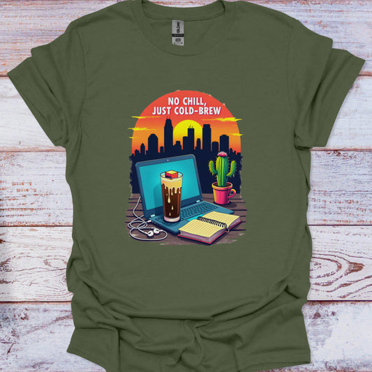 Green t-shirt with a graphic of a laptop, coffee, and cactus on a wooden surface