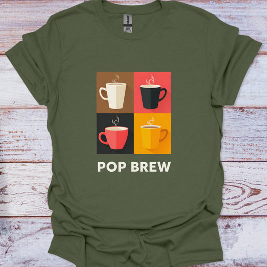 Green t-shirt with coffee cup graphic and 'Pop Brew' text on a wooden surface